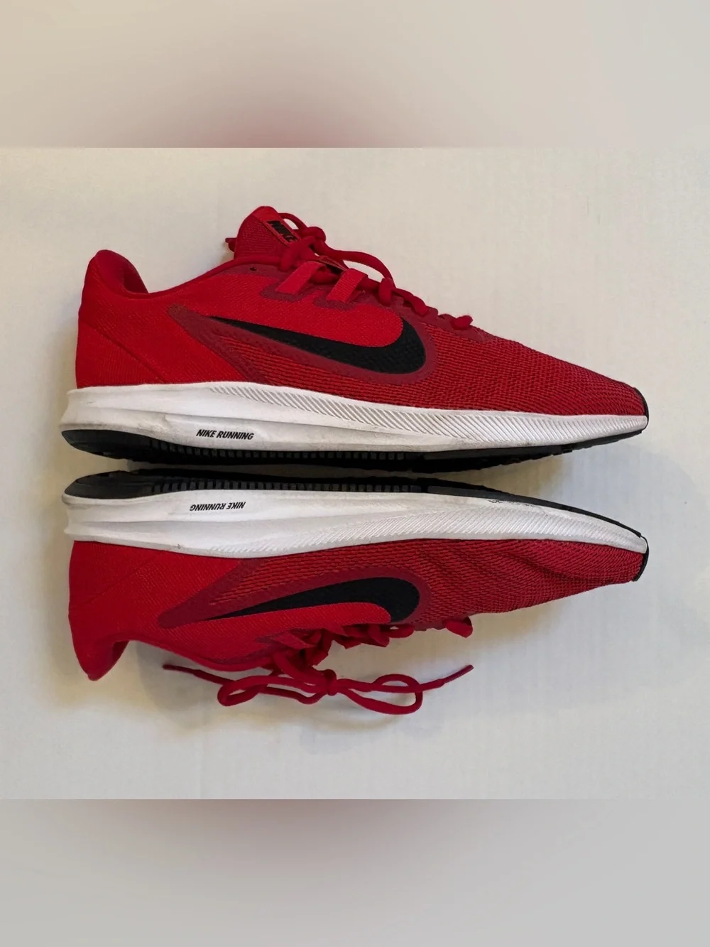 Nike Men’s Red Athletic Running Shoes with Black Swoosh